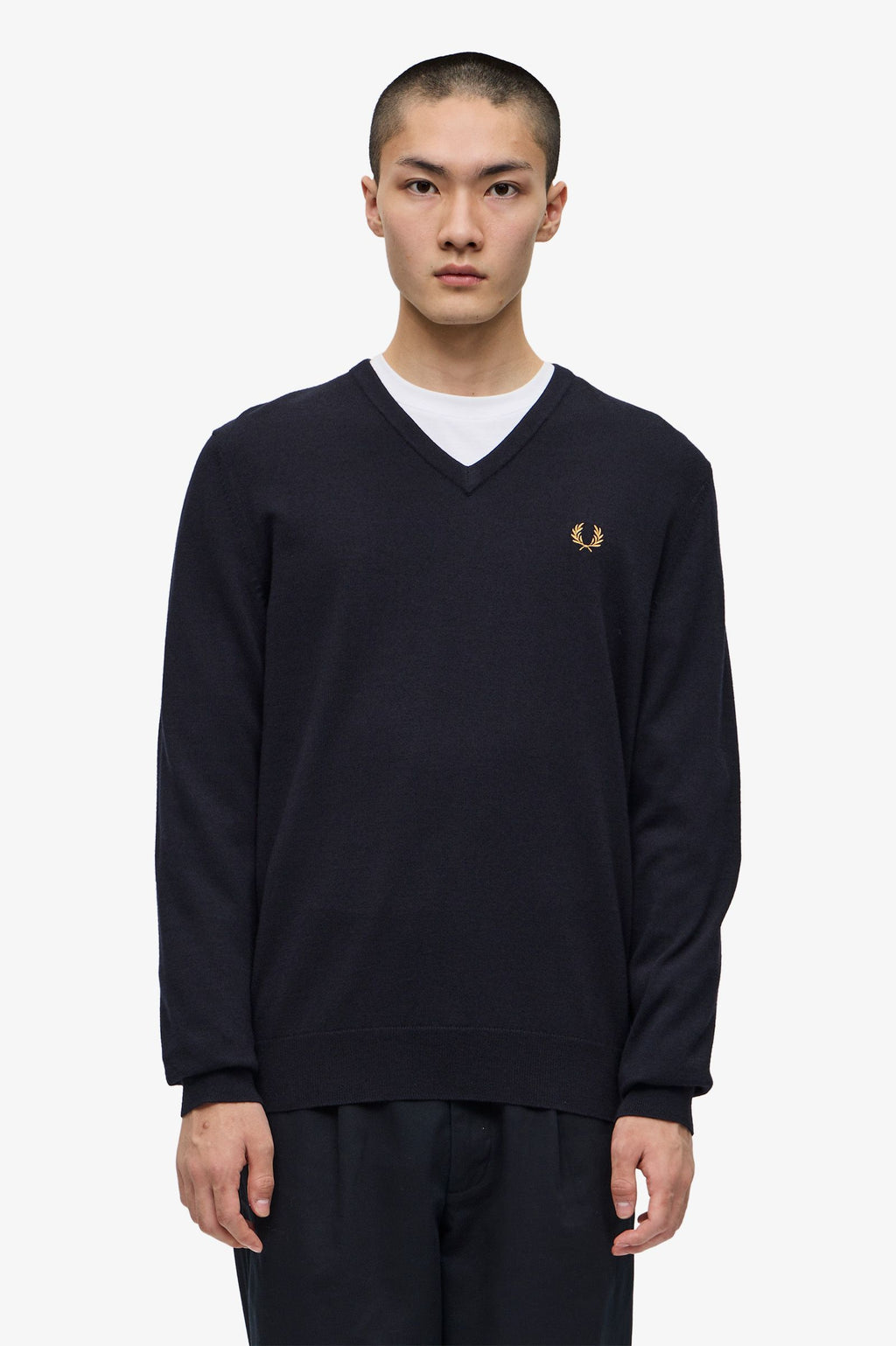 Pulls navy Fred Perry