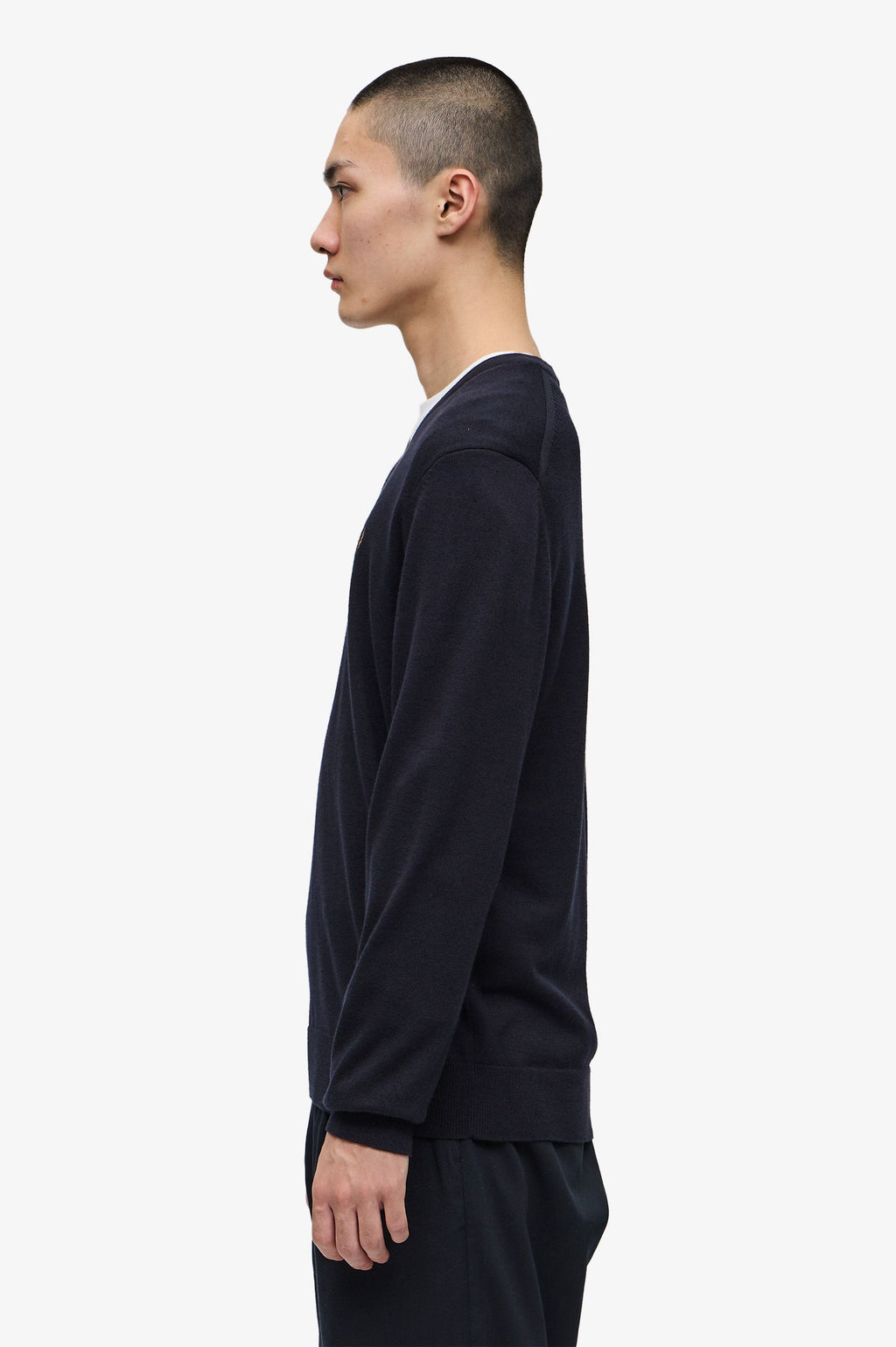 Pulls navy Fred Perry