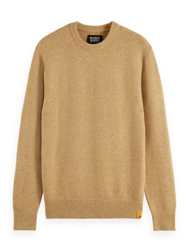 Pulls bruin Scotch & Soda