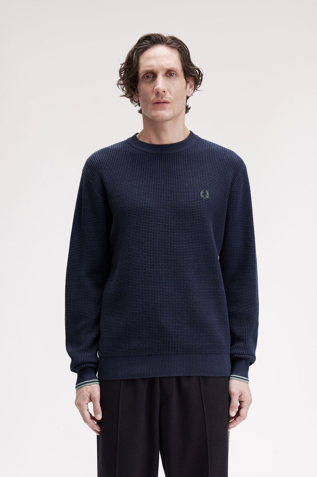 Pulls navy Fred Perry