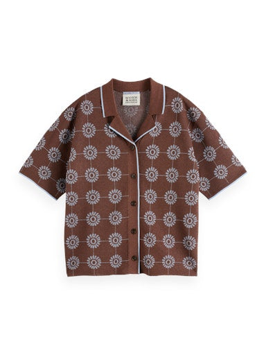 Pulls bruin Scotch & Soda
