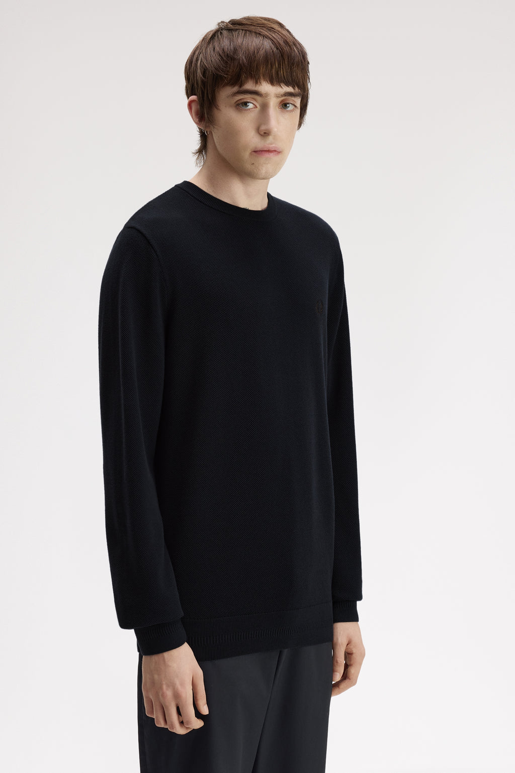 Pulls navy Fred Perry