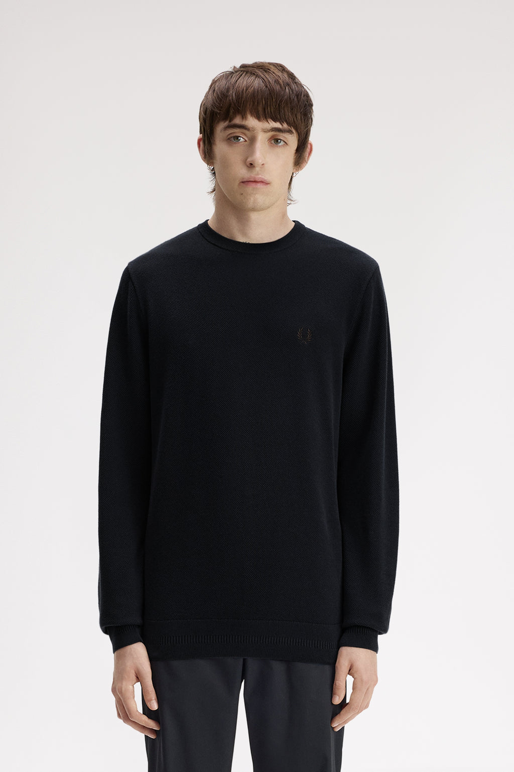 Pulls navy Fred Perry