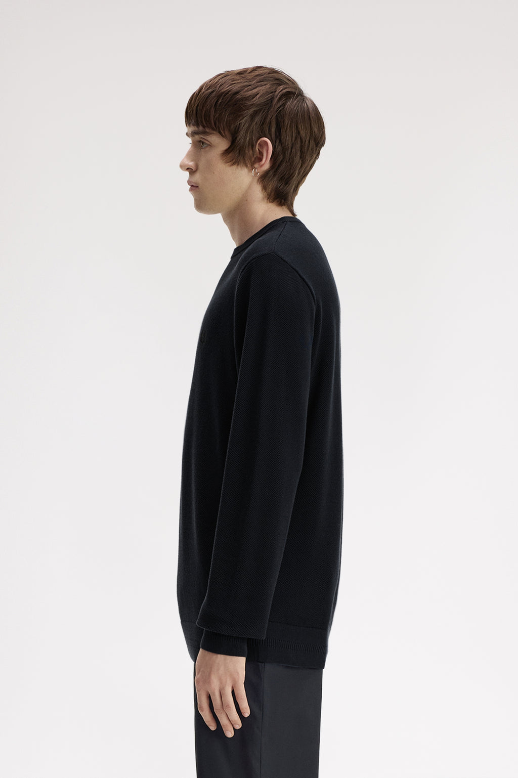 Pulls navy Fred Perry