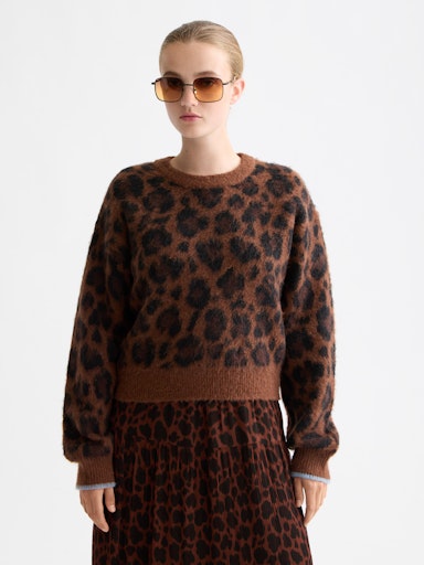 Pulls bruin Scotch & Soda