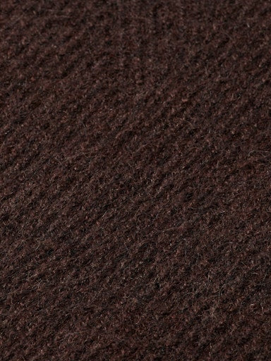 Pulls bruin Scotch & Soda