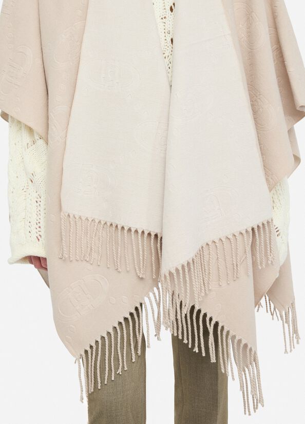 Poncho's beige Liu Jo