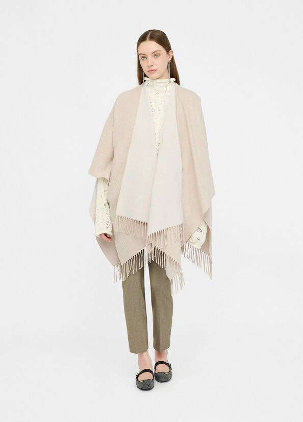 Poncho's beige Liu Jo