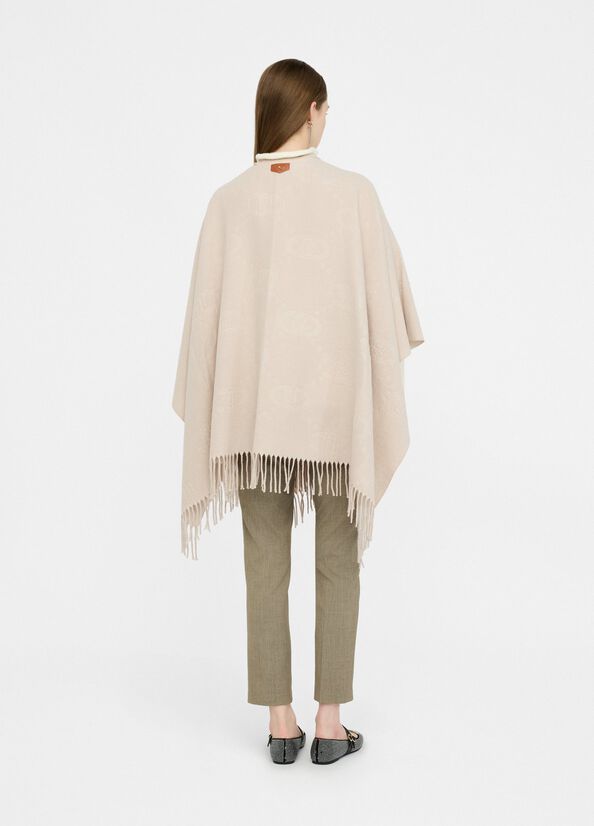 Poncho's beige Liu Jo