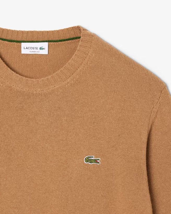Pulls bruin Lacoste
